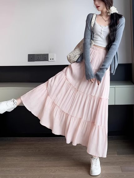 A Stylish White French Long Skirt with an Elastic Waistband, Featuring a Slimming A-Line Design And a Lining to Prevent Transparency, Perfect for Women.